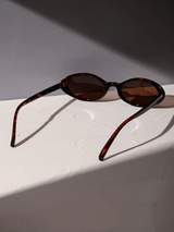 Lunettes de mode classique en plastique ovale à motif léopard pour femmes L’Art des Vêtements