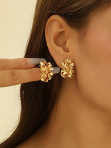 paire de boucles d'oreilles créoles dorées avec décoration florale, pour femmes L’Art des Vêtements