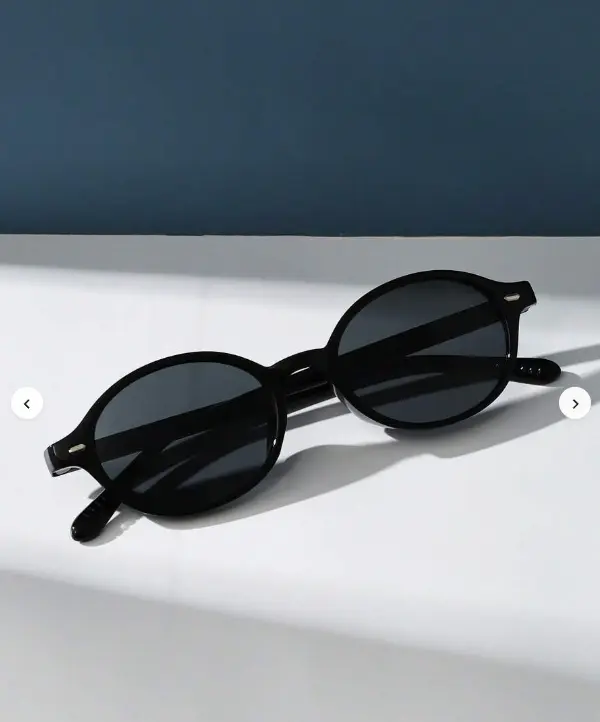 Lunettes de soleil mode à monture ovale rétro en plastique. Conception classique L’Art des Vêtements