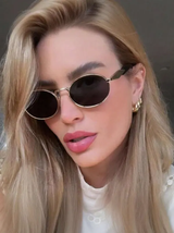 Lunettes de mode avec monture métallique ovale L’Art des Vêtements