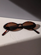 Lunettes de mode classique en plastique ovale à motif léopard pour femmes L’Art des Vêtements