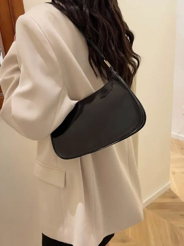 Sac à bandoulière minimaliste de couleur unie avec fermeture éclair L’Art des Vêtements