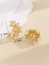 paire de boucles d'oreilles créoles dorées avec décoration florale, pour femmes L’Art des Vêtements